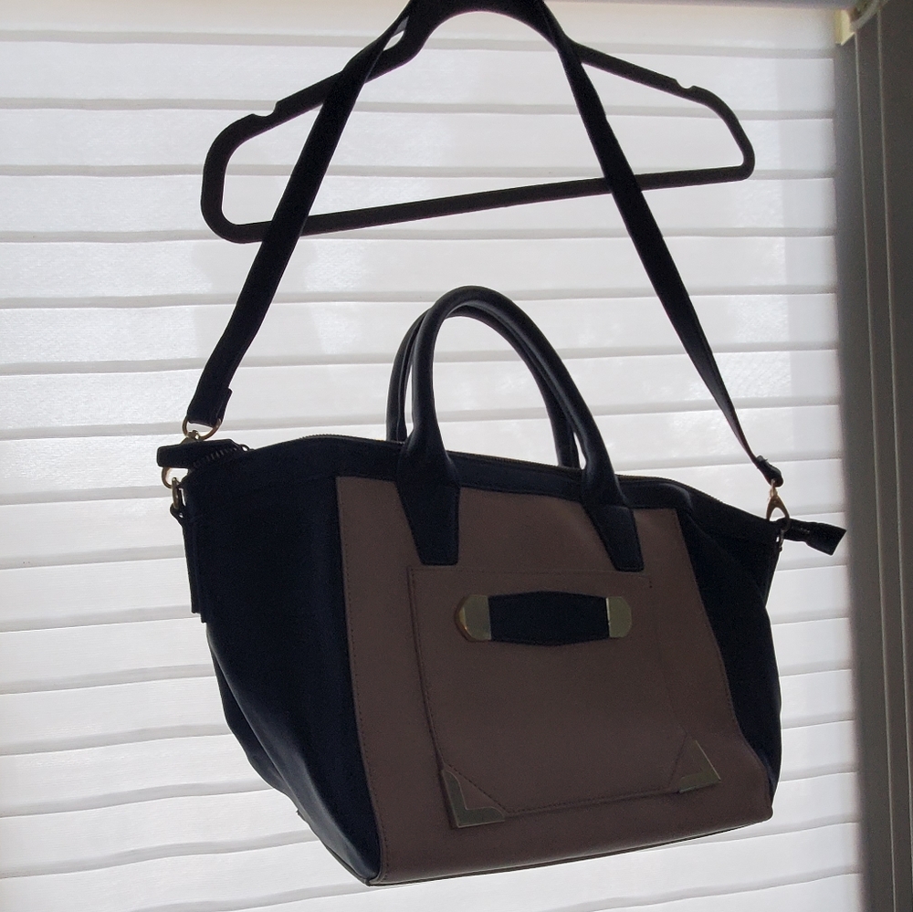 Danielle Nicole Satchel with shoulder strap, black and beige with gold buckles.